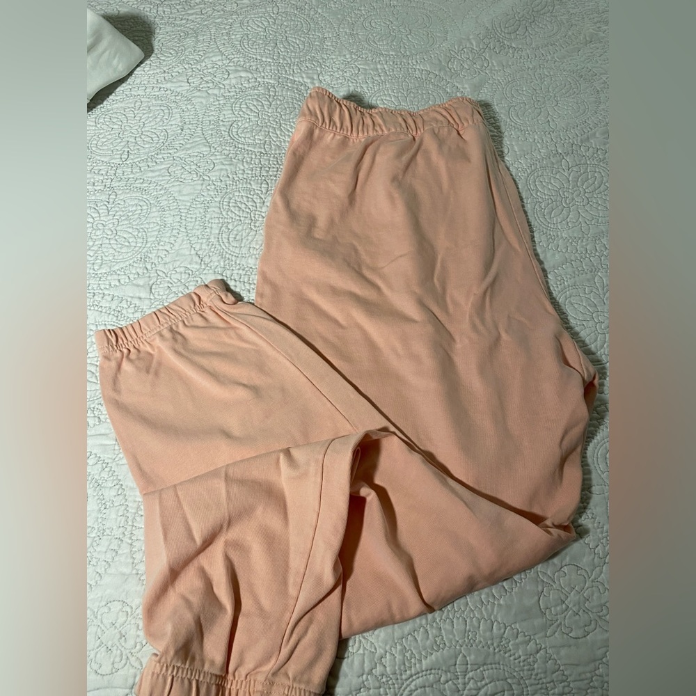 Lightly used pink/salmon Nike joggers